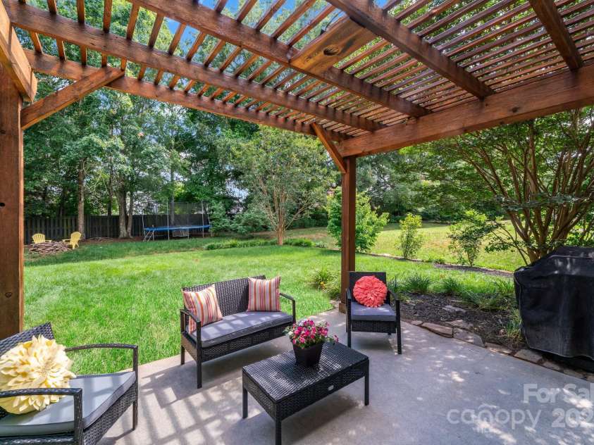 2907 Meherrin Court, Waxhaw, NC 28173.  MLS# CAR4150475, YatesRealty ID 2207. Cedar pergola covered patio