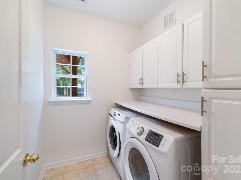 2907 Meherrin Court, Waxhaw, NC 28173.  MLS# CAR4150475, YatesRealty ID 2207. Main Floor Laundry Room