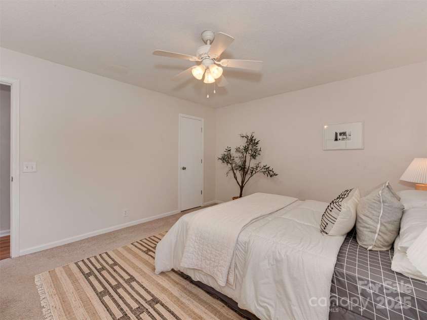 713 Springfield Drive, Concord, NC 28027.  MLS# CAR4269267, YatesRealty ID 22075. The primary bedroom includes a spacious step-in closet, providing just the right amount of storage for your everyday wardrobe.