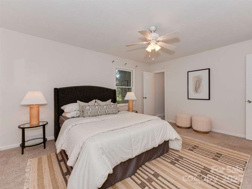 713 Springfield Drive, Concord, NC 28027.  MLS# CAR4269267, YatesRealty ID 22075. The primary suite is complete with its own half bath—perfect for everyday ease and personal space.