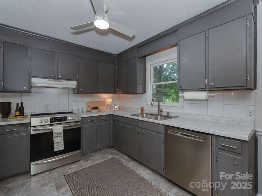 713 Springfield Drive, Concord, NC 28027.  MLS# CAR4269267, YatesRealty ID 22075. Thoughtfully designed for seamless flow, modern style, and everyday efficiency, this kitchen delivers both form and function.