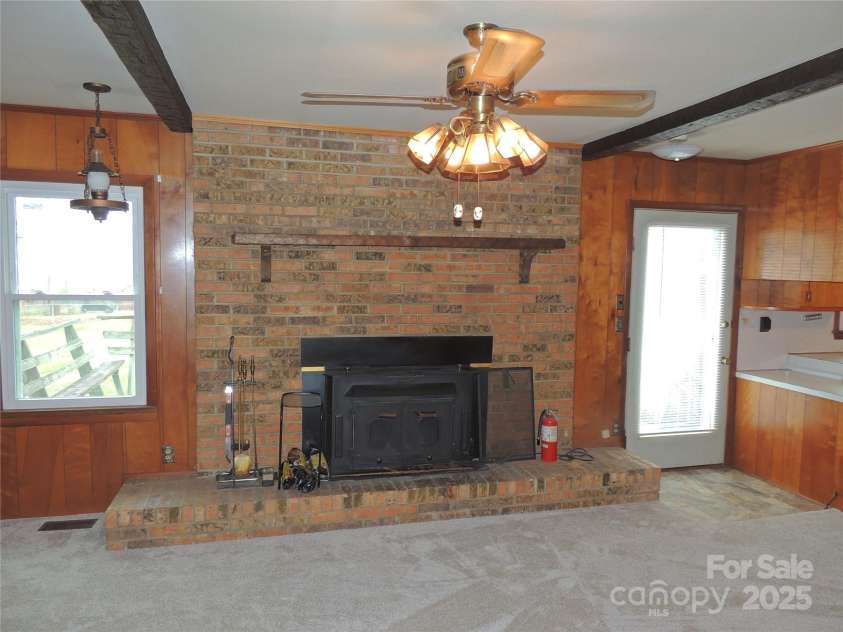 200 Allen Loop Road, Rutherfordton, NC 28139.  MLS# CAR4211065, YatesRealty ID 2208. Den fireplace