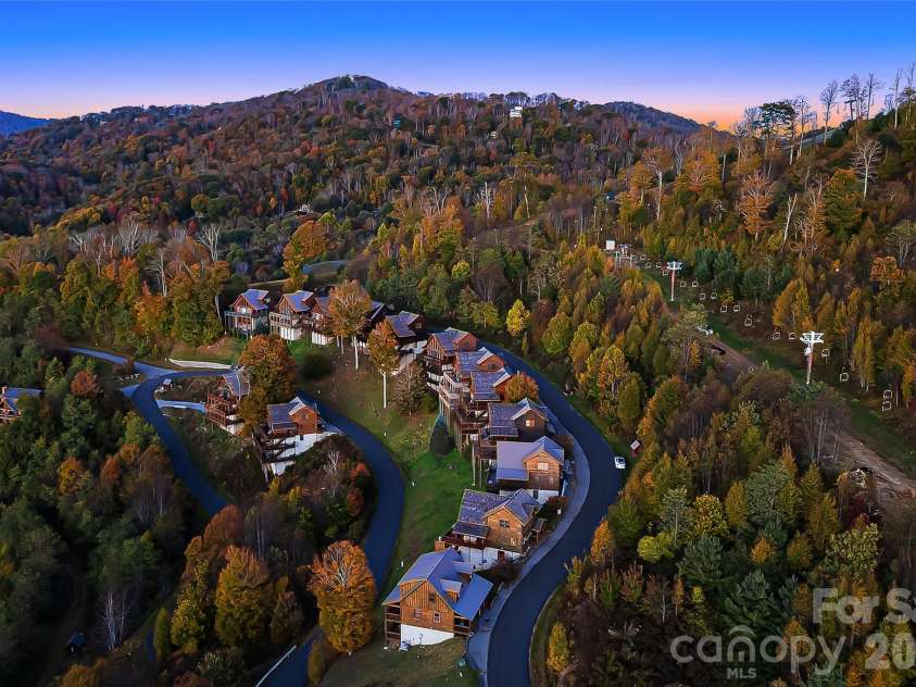 121 Scenic Wolf Drive, Mars Hill, NC 28754.  MLS# CAR4372121, YatesRealty ID 22080. A stone's throw from Hatley's Pointe Ski Destination