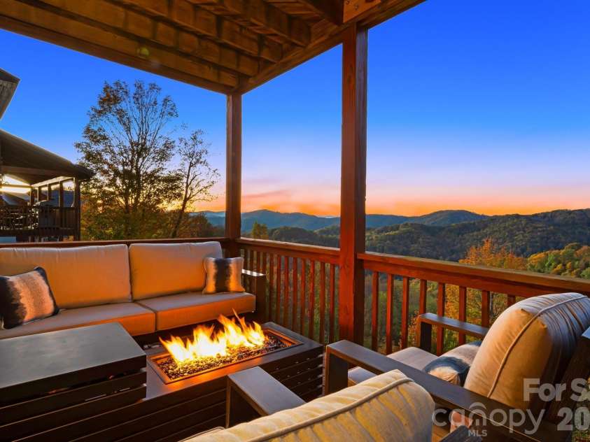 121 Scenic Wolf Drive, Mars Hill, NC 28754.  MLS# CAR4372121, YatesRealty ID 22080. Fire pit with phenomenal views