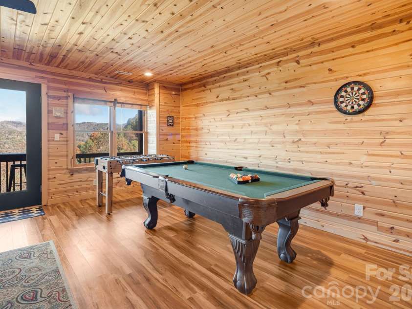 121 Scenic Wolf Drive, Mars Hill, NC 28754.  MLS# CAR4372121, YatesRealty ID 22080. Lower level billards room