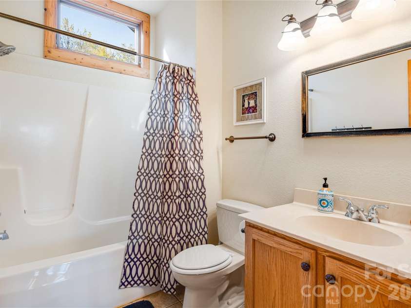 121 Scenic Wolf Drive, Mars Hill, NC 28754.  MLS# CAR4372121, YatesRealty ID 22080. Main level on-suite