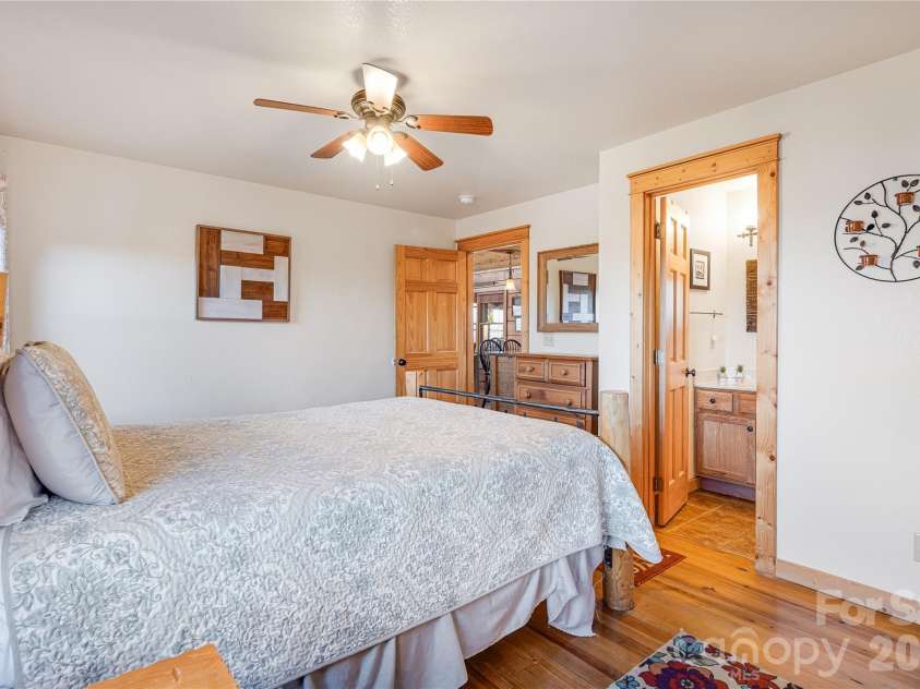 121 Scenic Wolf Drive, Mars Hill, NC 28754.  MLS# CAR4372121, YatesRealty ID 22080. Main level primary
