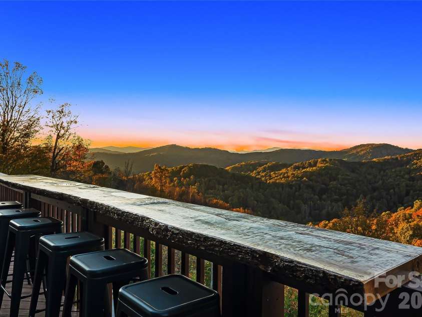 121 Scenic Wolf Drive, Mars Hill, NC 28754.  MLS# CAR4372121, YatesRealty ID 22080. New live edge bar area