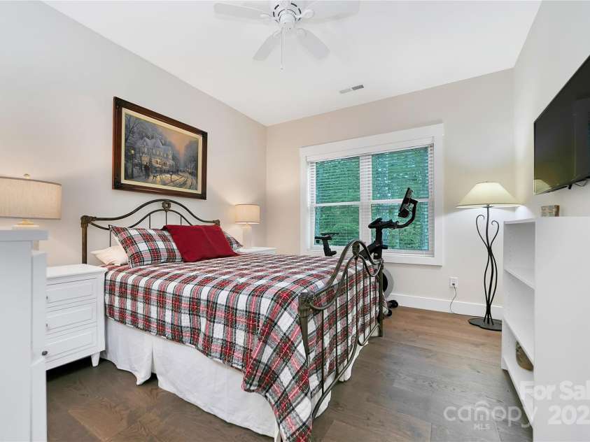 321 Middle Connestee Trail, Brevard, NC 28712.  MLS# CAR4271627, YatesRealty ID 22085. Guest bedroom