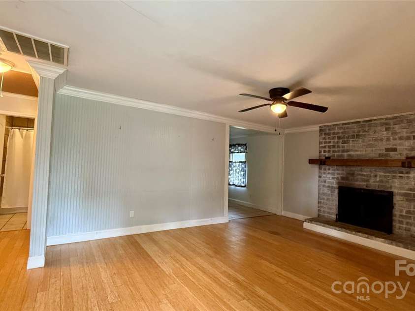 1057 Bethlehem Church Road, Grover, NC 28073.  MLS# CAR4269483, YatesRealty ID 22089. LR Fireplace.