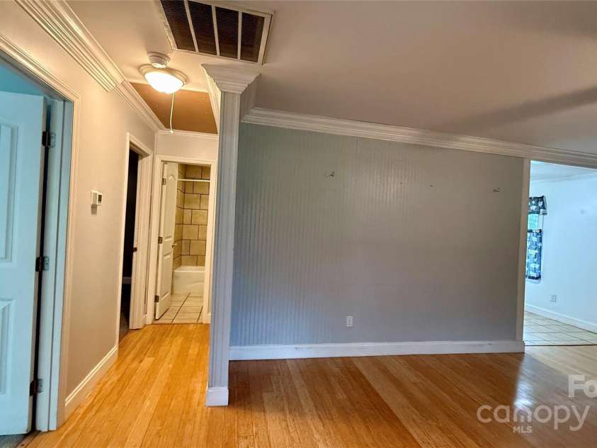 1057 Bethlehem Church Road, Grover, NC 28073.  MLS# CAR4269483, YatesRealty ID 22089. LR With split- Kitchen to right and beds/baths to left.