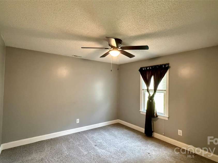 1057 Bethlehem Church Road, Grover, NC 28073.  MLS# CAR4269483, YatesRealty ID 22089. Rear Left BR