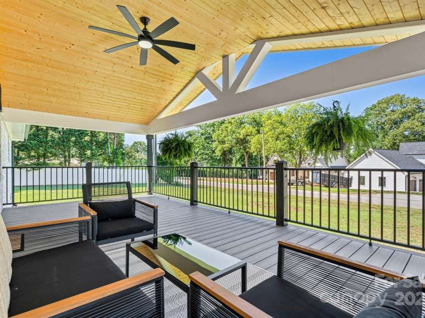 139 Elysian Drive, Mooresville, NC 28117.  MLS# CAR4256818, YatesRealty ID 22091. Spacious Front Deck