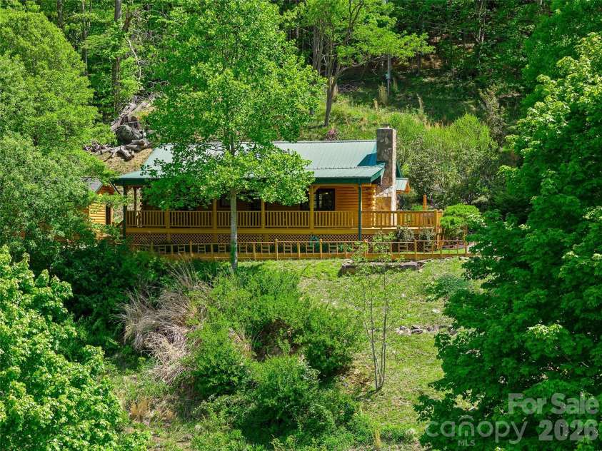 115 Sutton Ridge Road, Burnsville, NC 28714.  MLS# CAR4376173, YatesRealty ID 22099. 