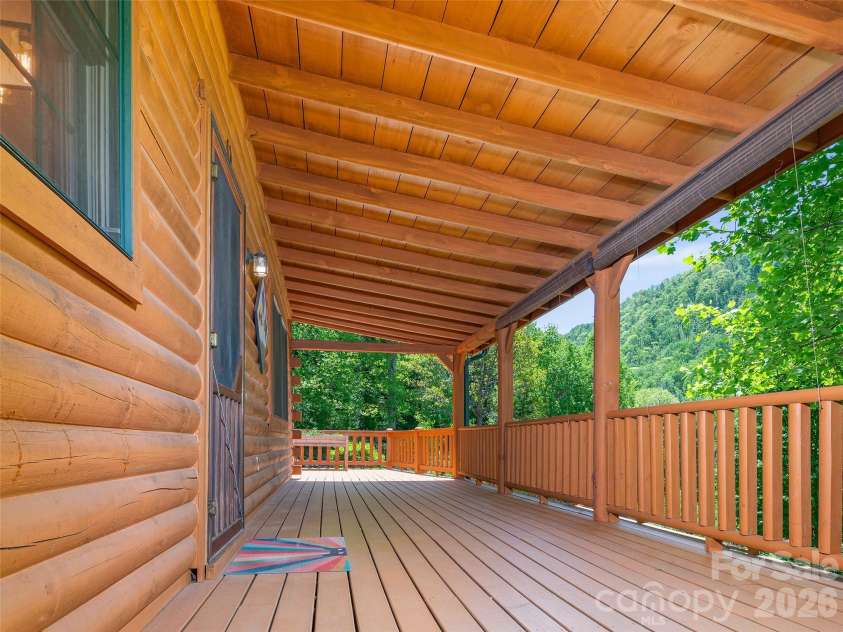 115 Sutton Ridge Road, Burnsville, NC 28714.  MLS# CAR4376173, YatesRealty ID 22099. Covered Front Porch