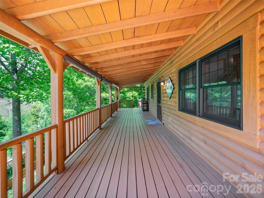 115 Sutton Ridge Road, Burnsville, NC 28714.  MLS# CAR4376173, YatesRealty ID 22099. Covered Front Porch