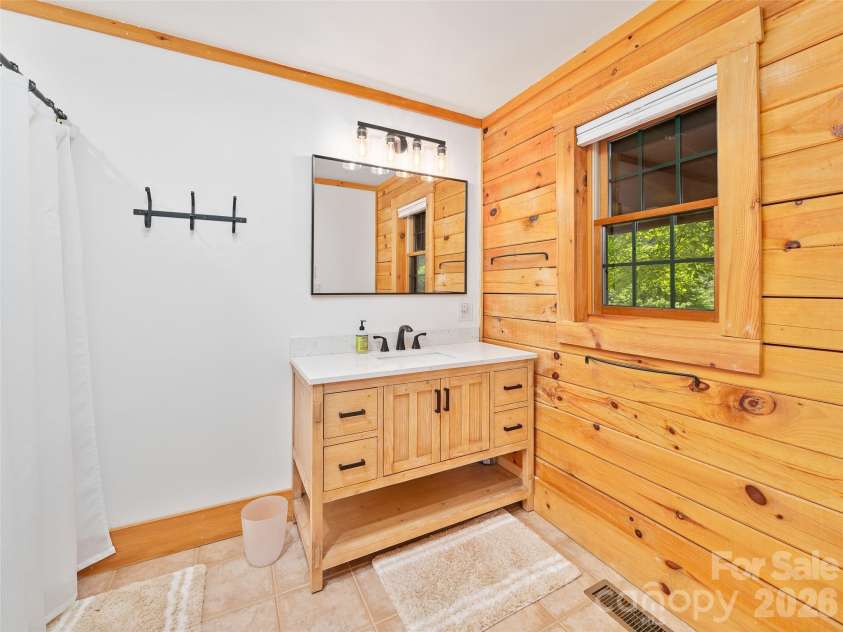 115 Sutton Ridge Road, Burnsville, NC 28714.  MLS# CAR4376173, YatesRealty ID 22099. Ensuite Primary Bathroom