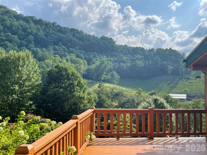 115 Sutton Ridge Road, Burnsville, NC 28714.  MLS# CAR4376173, YatesRealty ID 22099. Porch Views