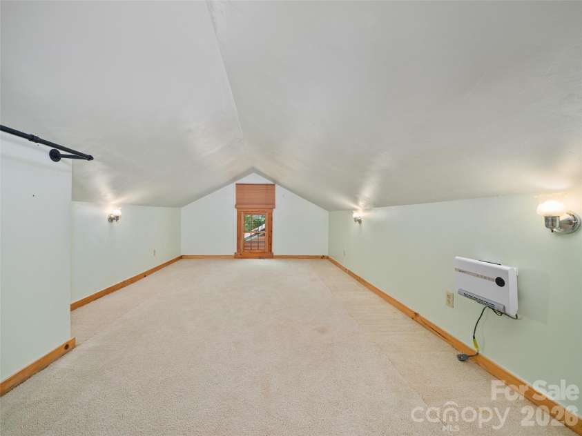 115 Sutton Ridge Road, Burnsville, NC 28714.  MLS# CAR4376173, YatesRealty ID 22099. Upstairs Heated Loft/Bonus Space