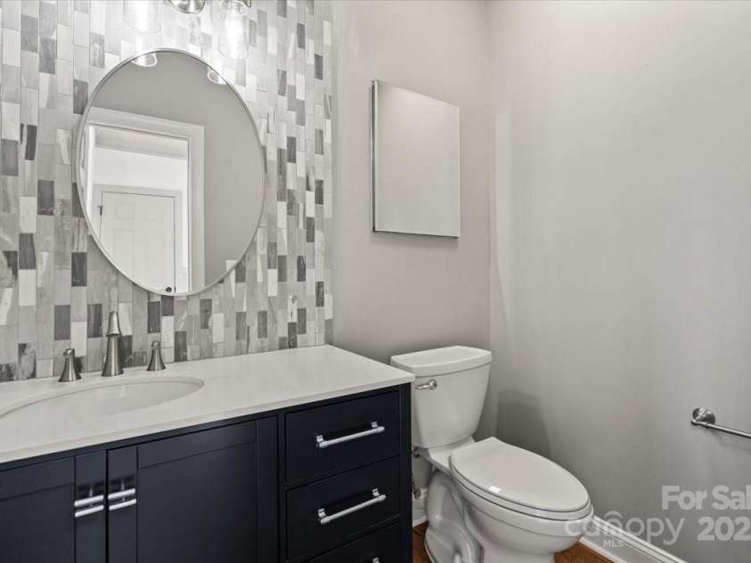 11809 Farnborough Road, Huntersville, NC 28078.  MLS# CAR4315816, YatesRealty ID 2210. 1st floor powder room. Sellers have architectural plans to convert to a full bathroom