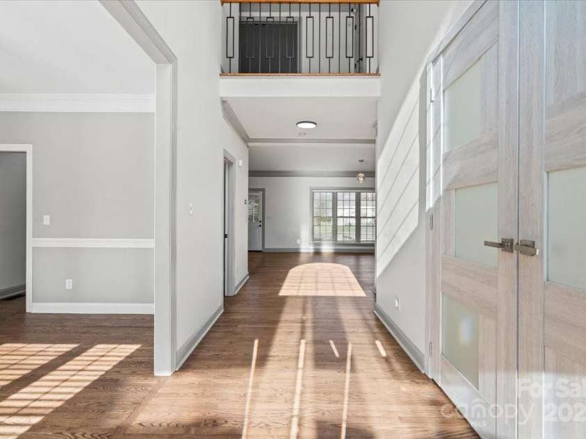 11809 Farnborough Road, Huntersville, NC 28078.  MLS# CAR4315816, YatesRealty ID 2210. Office on the right