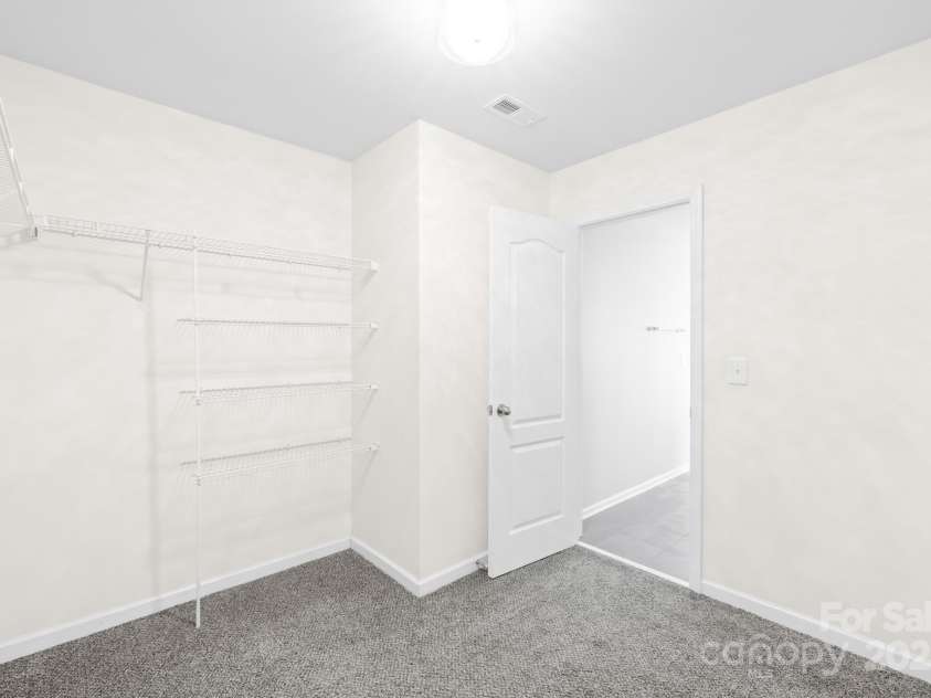 3022 Oakmere Road, Waxhaw, NC 28173.  MLS# CAR4249075, YatesRealty ID 22108. Huge walk in closet in the primary suite.