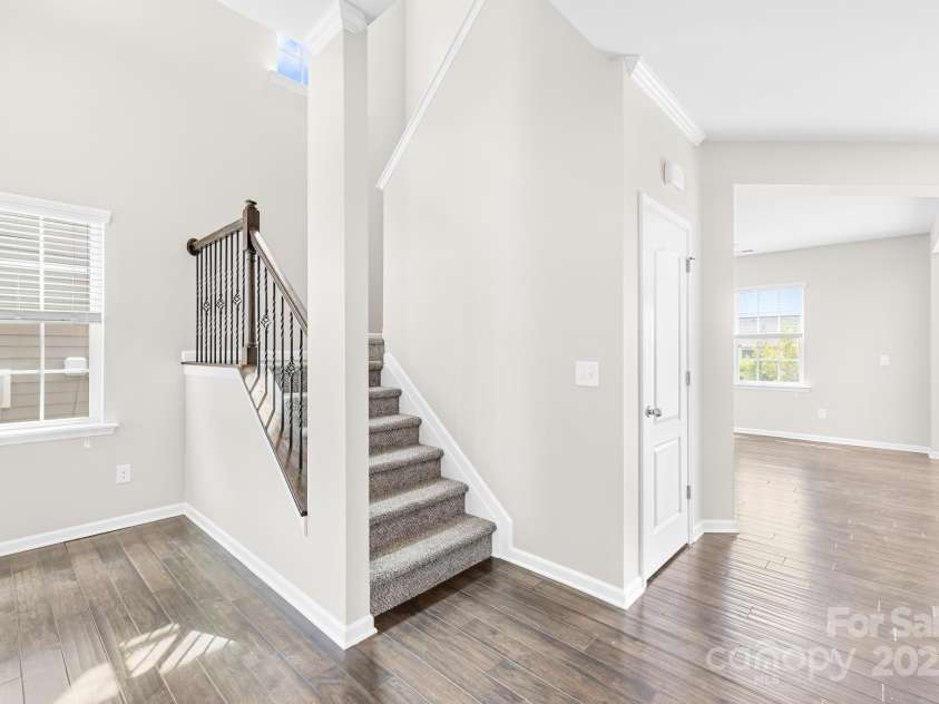3022 Oakmere Road, Waxhaw, NC 28173.  MLS# CAR4249075, YatesRealty ID 22108. Staircase is located towards the front of the home and leads upstairs to the 3 bedrooms and 2 full baths.