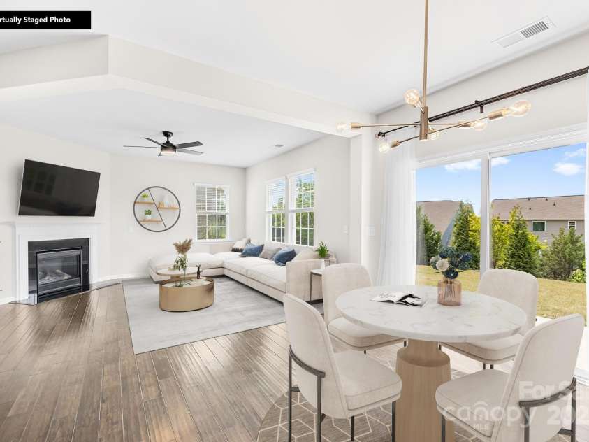 3022 Oakmere Road, Waxhaw, NC 28173.  MLS# CAR4249075, YatesRealty ID 22108. Virtual staging of the living and dining areas.