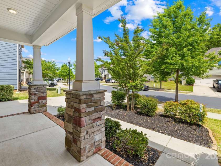 3022 Oakmere Road, Waxhaw, NC 28173.  MLS# CAR4249075, YatesRealty ID 22108. Watch the world go by on the front porch of this beautiful Millbridge home.