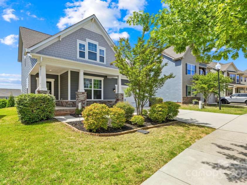 3022 Oakmere Road, Waxhaw, NC 28173.  MLS# CAR4249075, YatesRealty ID 22108. Welcome to 3022 Oakmere Road, a stunning home in award-winning Millbridge! Featuring charming curb appeal with a rocking chair front porch and manicured landscaping.