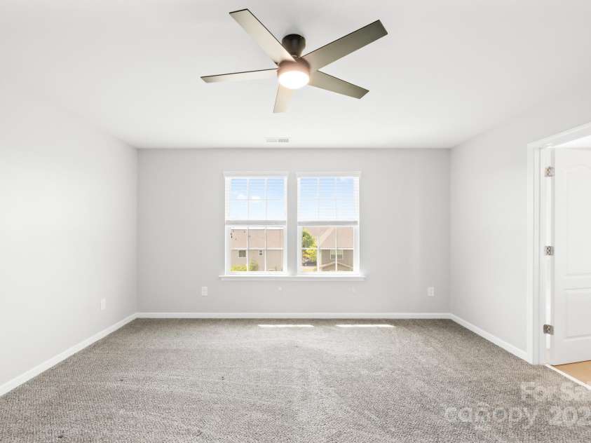 3022 Oakmere Road, Waxhaw, NC 28173.  MLS# CAR4249075, YatesRealty ID 22108. Whether it’s morning sunshine you want or a quiet evening, this primary suite offers the perfect space to recharge.