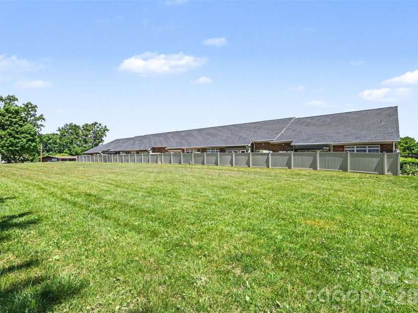 908 Davie Avenue, Statesville, NC 28677.  MLS# CAR4377914, YatesRealty ID 22108. Back Area of Complex