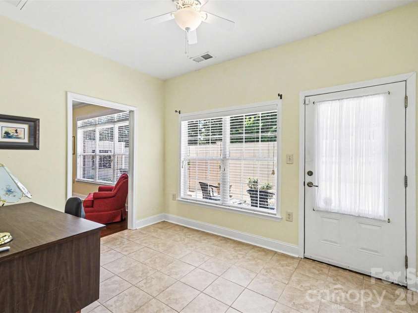 908 Davie Avenue, Statesville, NC 28677.  MLS# CAR4377914, YatesRealty ID 22108. Bright Inviting Sunroom