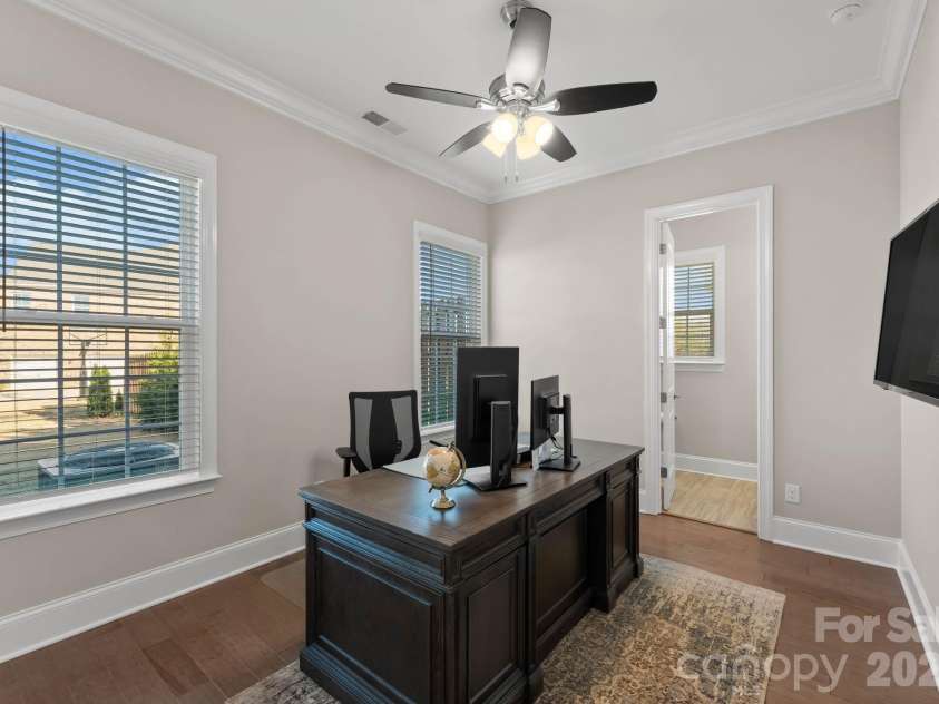1053 Harlow's Crossing Drive, Matthews, NC 28104.  MLS# CAR4353232, YatesRealty ID 22111. Main-level bedroom or office
