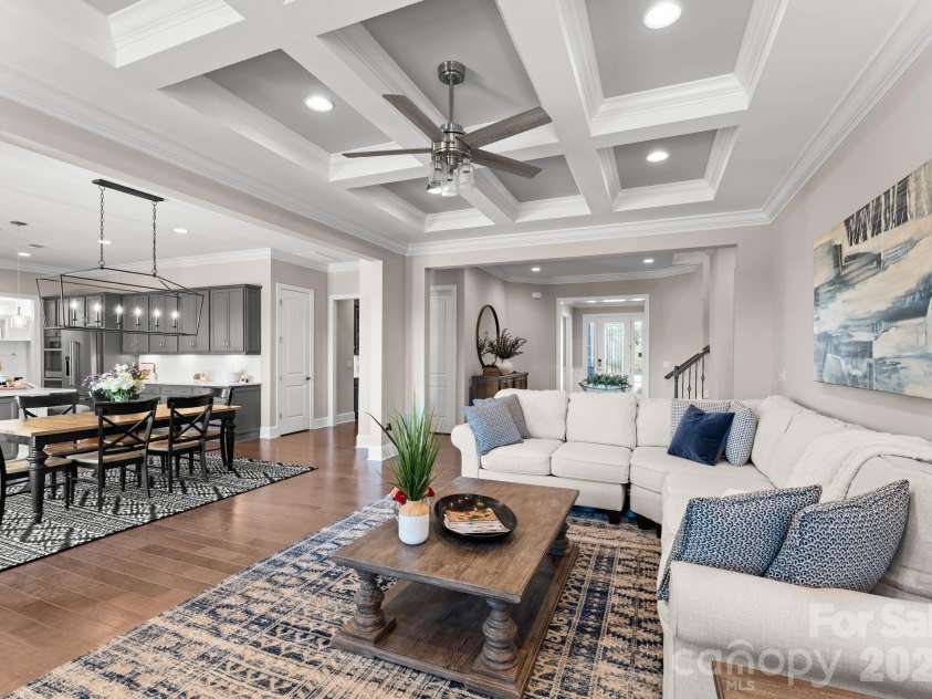 1053 Harlow's Crossing Drive, Matthews, NC 28104.  MLS# CAR4353232, YatesRealty ID 22111. Open floor plan with living room flowing into dining and kitchen