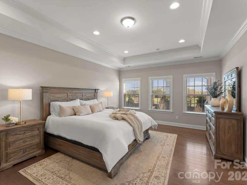 1053 Harlow's Crossing Drive, Matthews, NC 28104.  MLS# CAR4353232, YatesRealty ID 22111. Primary suite with abundant natural light