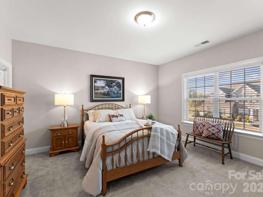 1053 Harlow's Crossing Drive, Matthews, NC 28104.  MLS# CAR4353232, YatesRealty ID 22111. Secondary bedroom