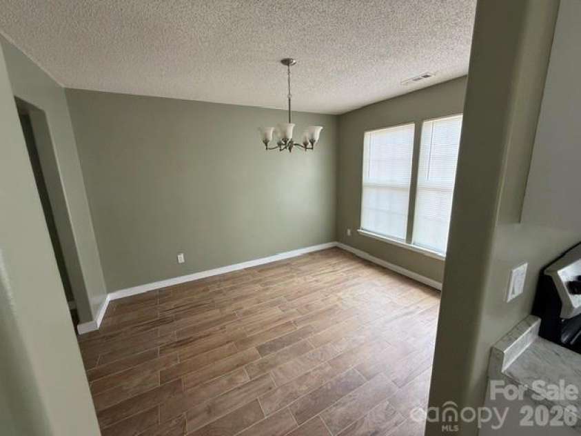 1141 Cureton Place, Charlotte, NC 28217.  MLS# CAR4381082, YatesRealty ID 22116. Formal dining room