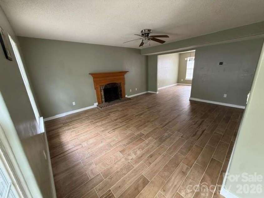 1141 Cureton Place, Charlotte, NC 28217.  MLS# CAR4381082, YatesRealty ID 22116. Great Room with fireplace