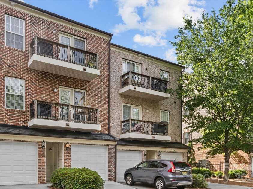 1530 Church Street, Charlotte, NC 28203.  MLS# CAR4259116, YatesRealty ID 22130. From your garage, enter into the home via stairs.  A door from the garage also leads to the parking area behind the building.