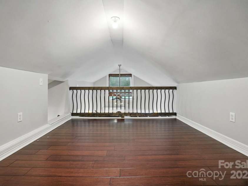 4235 Howie Circle, Charlotte, NC 28205.  MLS# CAR4258170, YatesRealty ID 22134. King sized loft