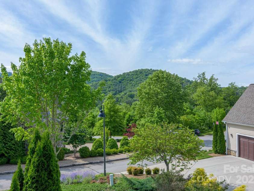 17 Kiftsgate Court, Asheville, NC 28804.  MLS# CAR4242474, YatesRealty ID 22138. Front of home has nice views to the East