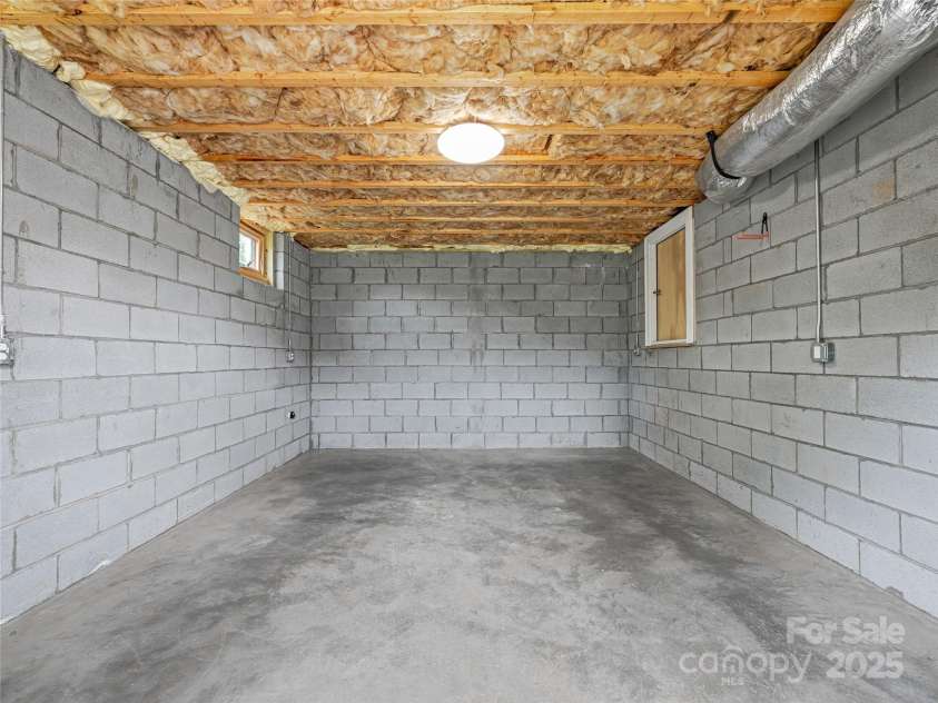 17 Kiftsgate Court, Asheville, NC 28804.  MLS# CAR4242474, YatesRealty ID 22138. Lower level Basement