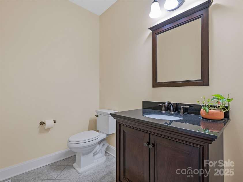 17 Kiftsgate Court, Asheville, NC 28804.  MLS# CAR4242474, YatesRealty ID 22138. Powder Room on Main Level