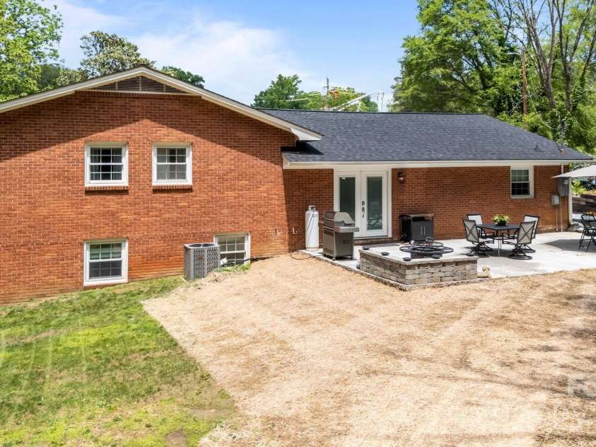 2076 Junction Road, Mocksville, NC 27028.  MLS# CAR4256563, YatesRealty ID 22143. Newly sown grass