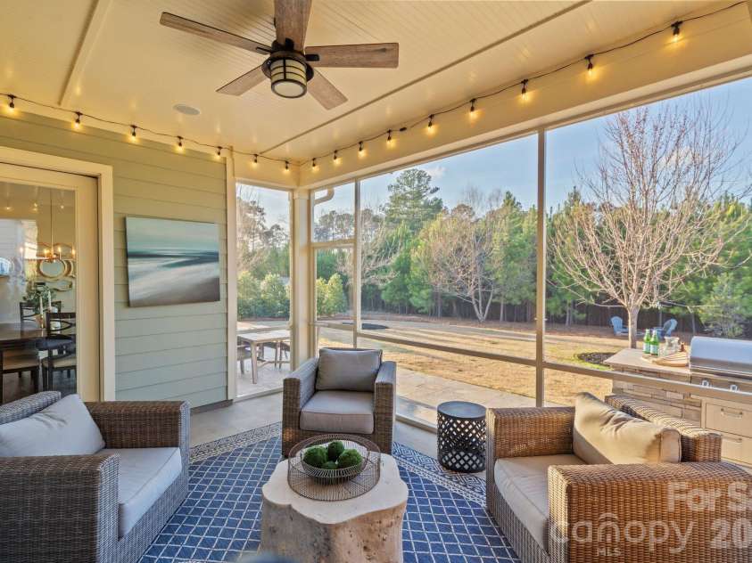 2068 Paddlers Cove Drive, Clover, SC 29710.  MLS# CAR4351985, YatesRealty ID 22145. Fire pit out the back