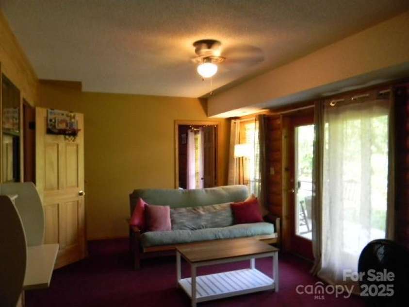 1425 Sorrells Cove Road, Clyde, NC 28721.  MLS# CAR4274048, YatesRealty ID 22147. Family Room