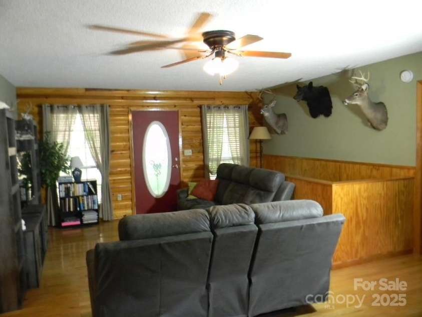 1425 Sorrells Cove Road, Clyde, NC 28721.  MLS# CAR4274048, YatesRealty ID 22147. Living Room