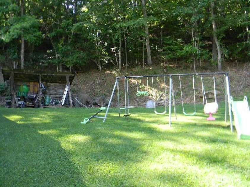 1425 Sorrells Cove Road, Clyde, NC 28721.  MLS# CAR4274048, YatesRealty ID 22147. Yard