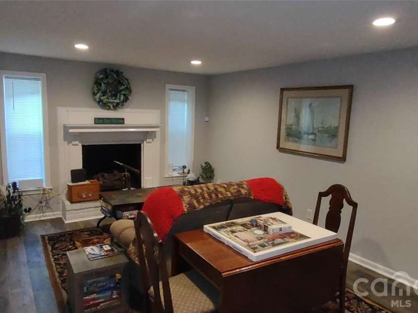 769 Dennis Road, Troy, NC 27371.  MLS# CAR4374021, YatesRealty ID 22151. Den beyond kitchen